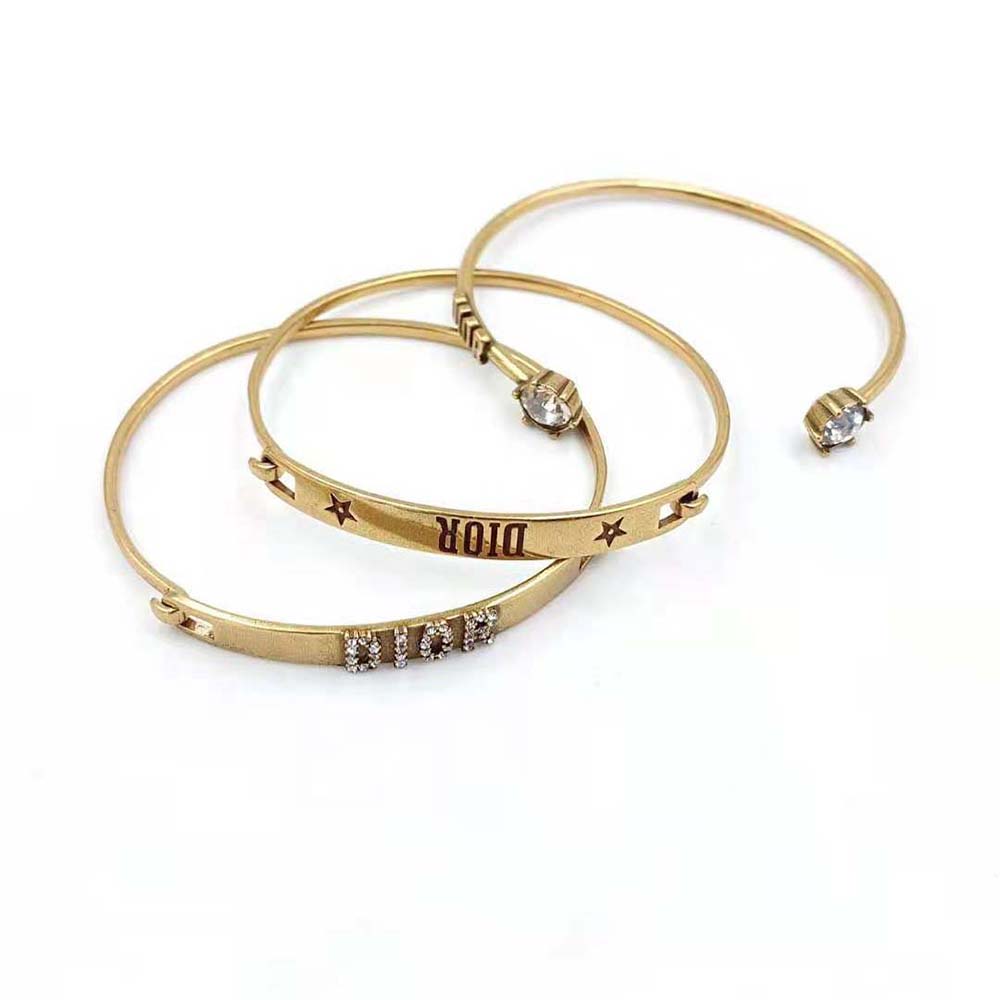 Side view showing antique gold finish on Dior Women Dio(r)evolution Bracelet Set
