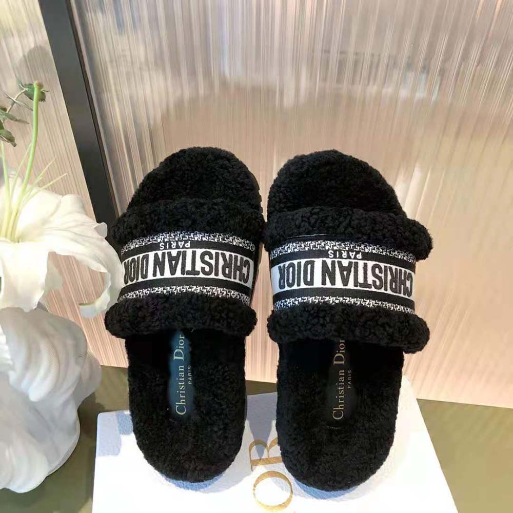 Side profile showing cushioned sole of Dior Women Dway Slide Black Embroidered Cotton and Shearling
