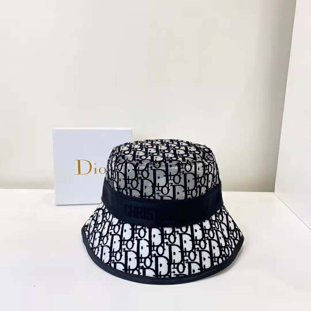 Side angle showcasing small brim and stitching on Dior bucket hat