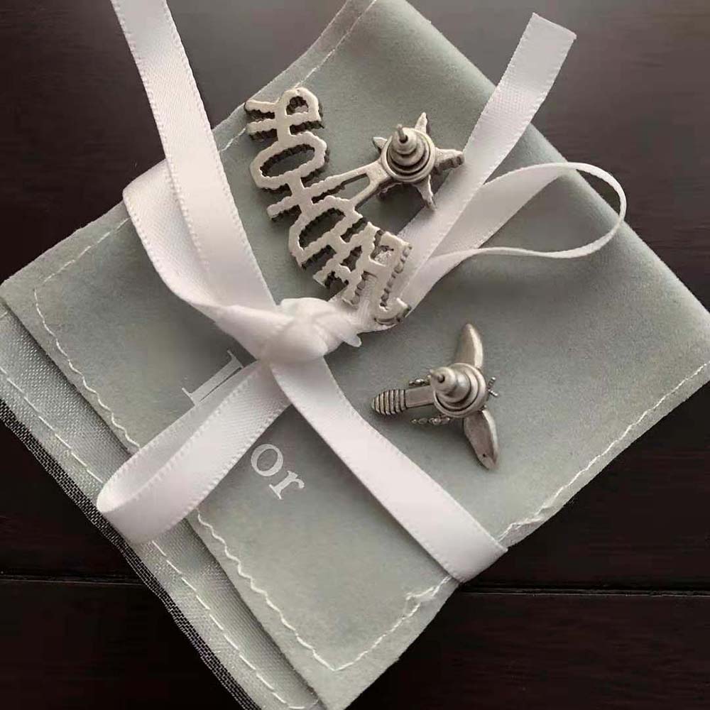 Side angle showing silhouette and antique palladium finish on Dior Women J adior Earrings