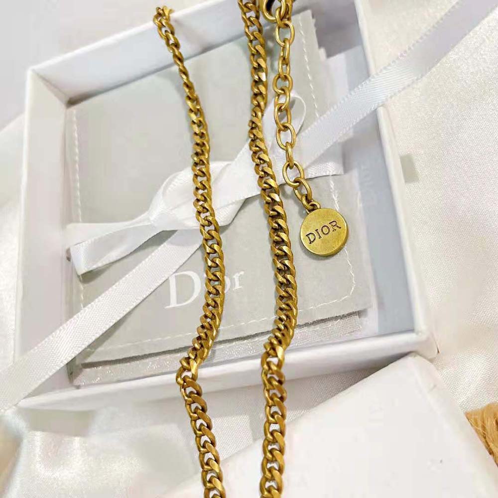 Side angle showing lobster clasp and chain of Dior Women J adior Necklace