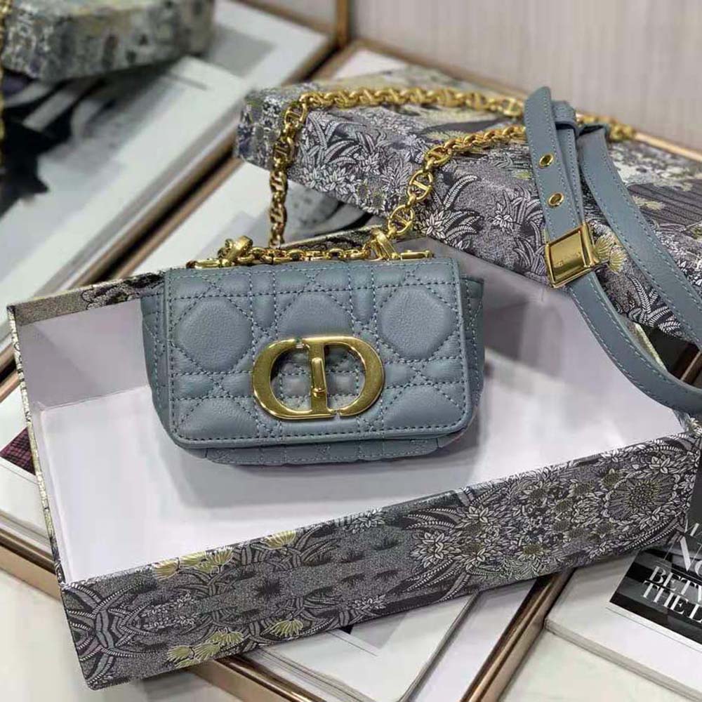 Close-up detail of silver Dior logo on Micro Dior Caro Bag Cloud Blue