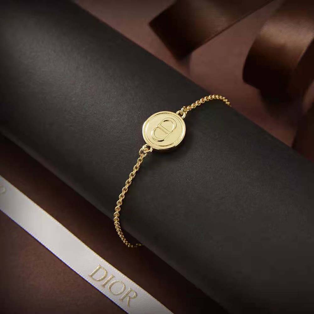 Side view showing slim silhouette of Dior Women Petit CD Bracelet