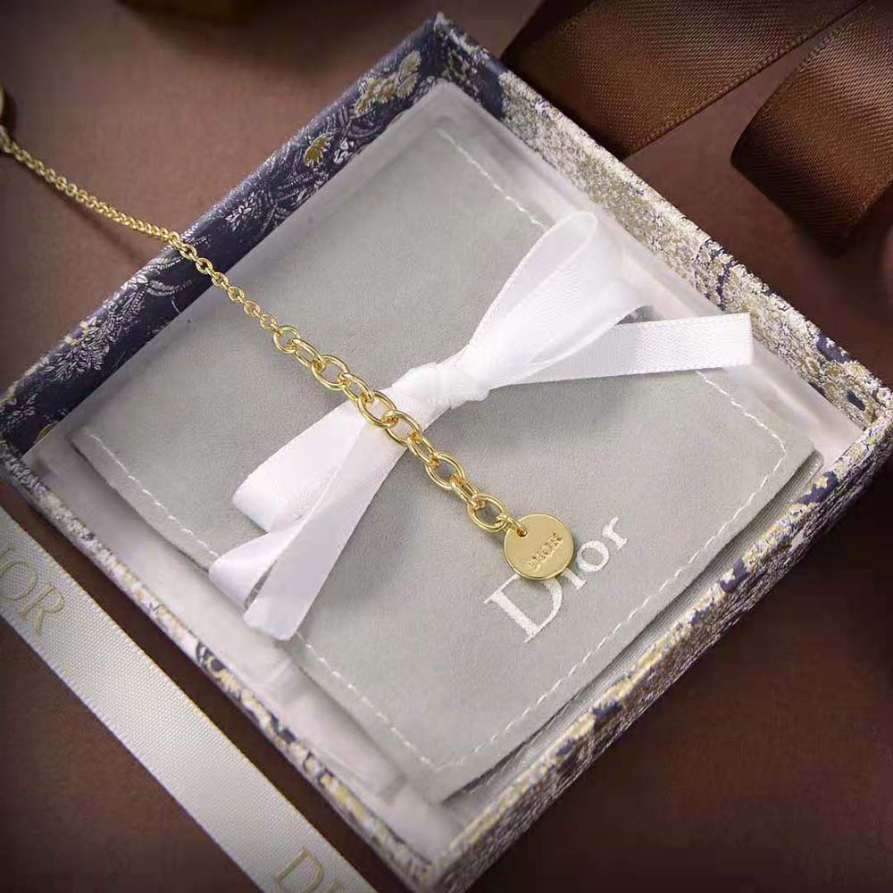 Side angle showing delicate chain and clasp of Dior Women Petit CD Necklace