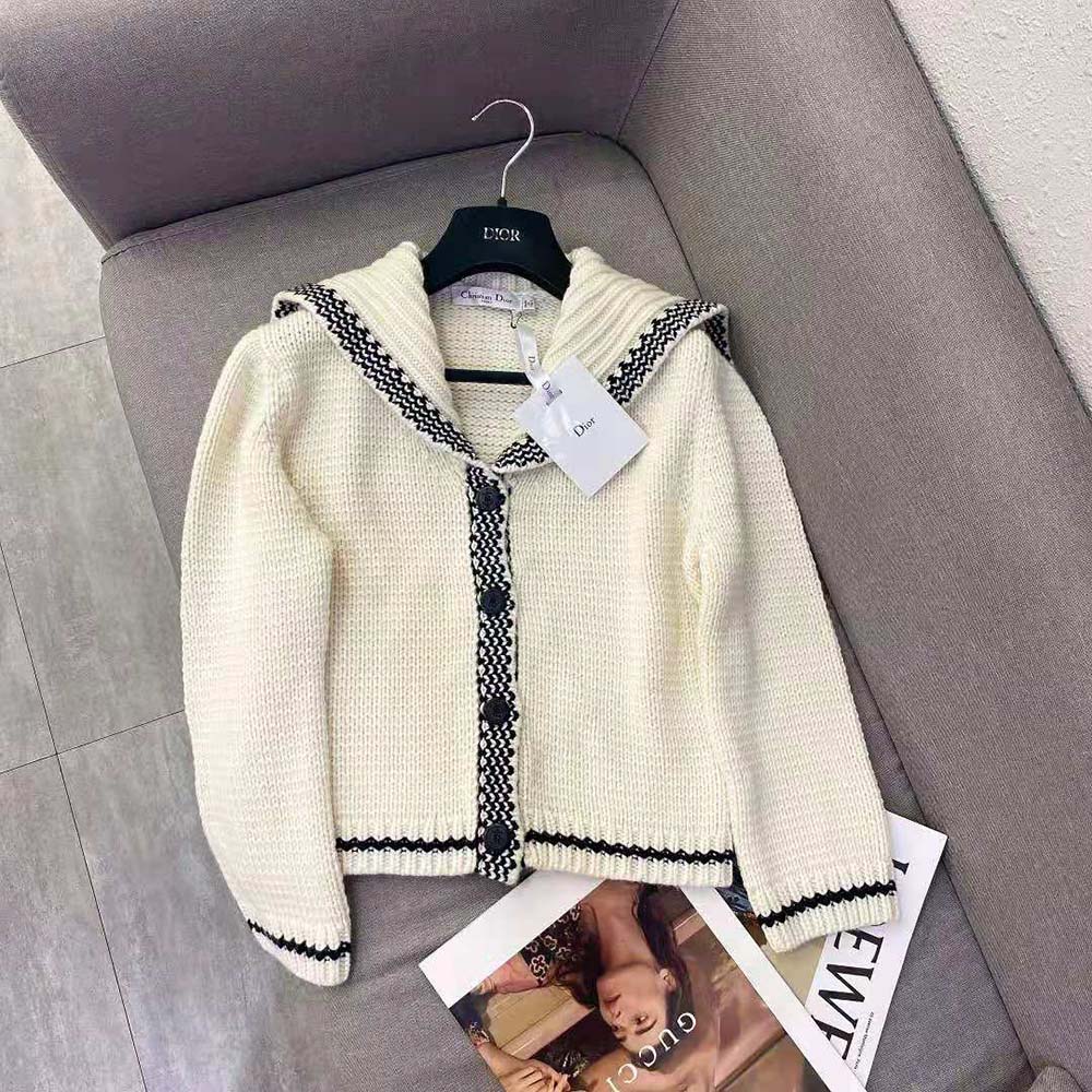 Close-up of sailor collar and Dior engraved buttons on cardigan