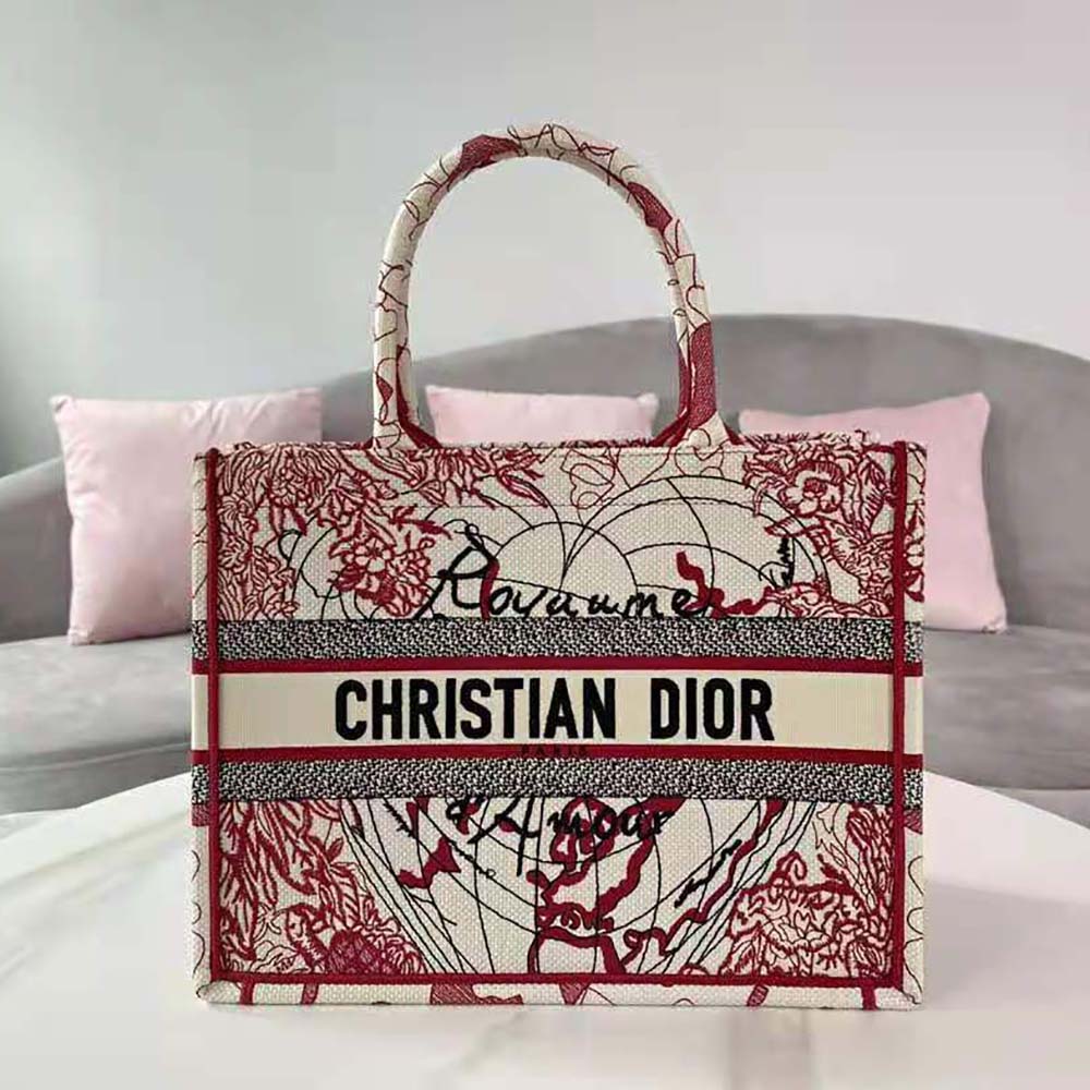 Side angle showing silhouette and silver hardware on Dior Women Small Dior Book Tote