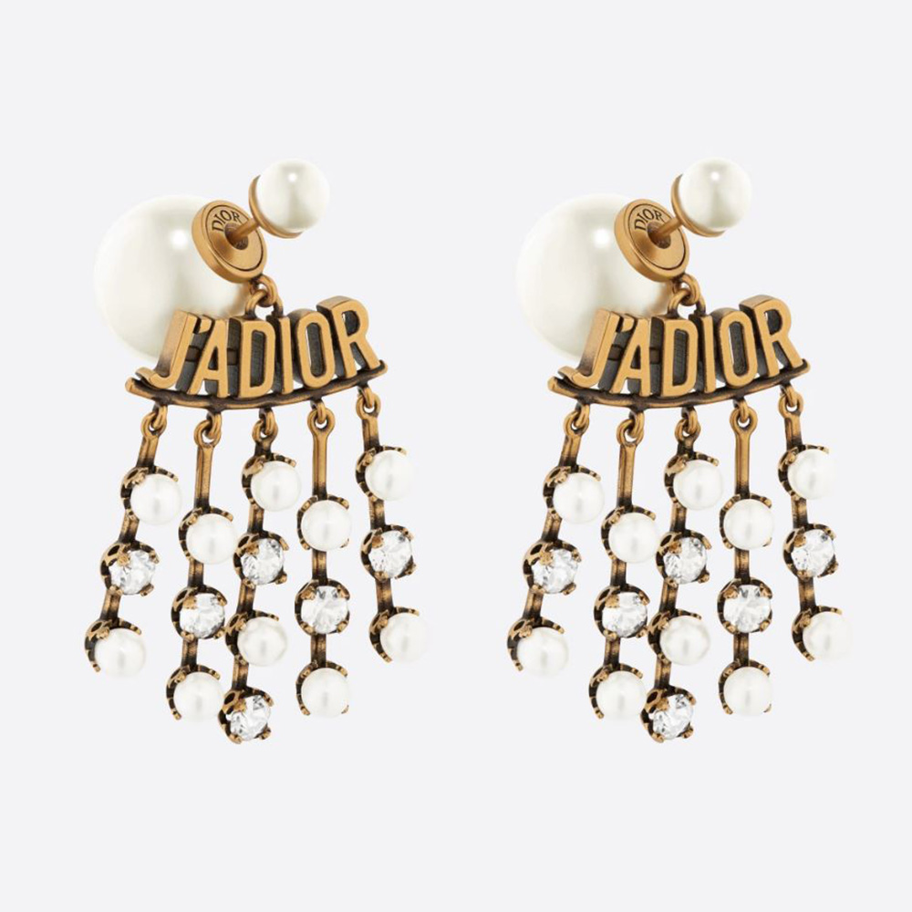 Close-up of Dior Women Tribales Earrings antique gold and white pearls