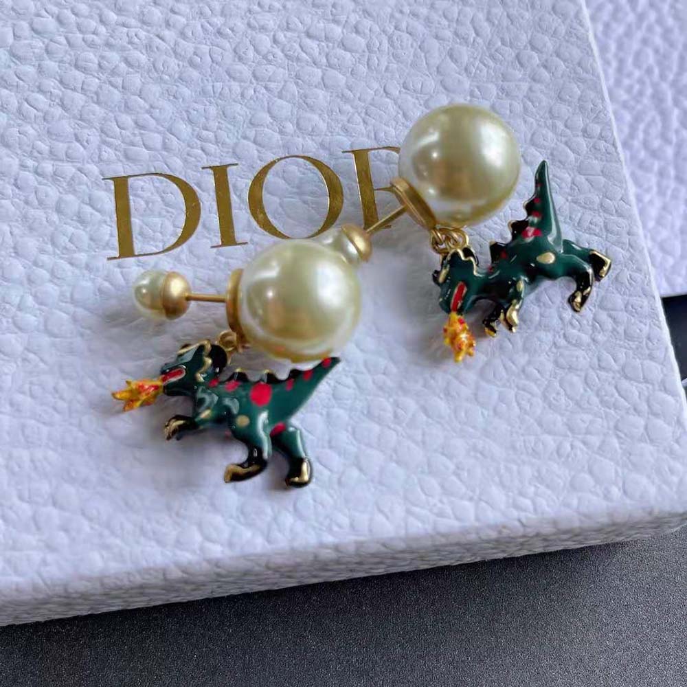 Dior Women Tribales Earrings displayed on model’s ear with soft lighting