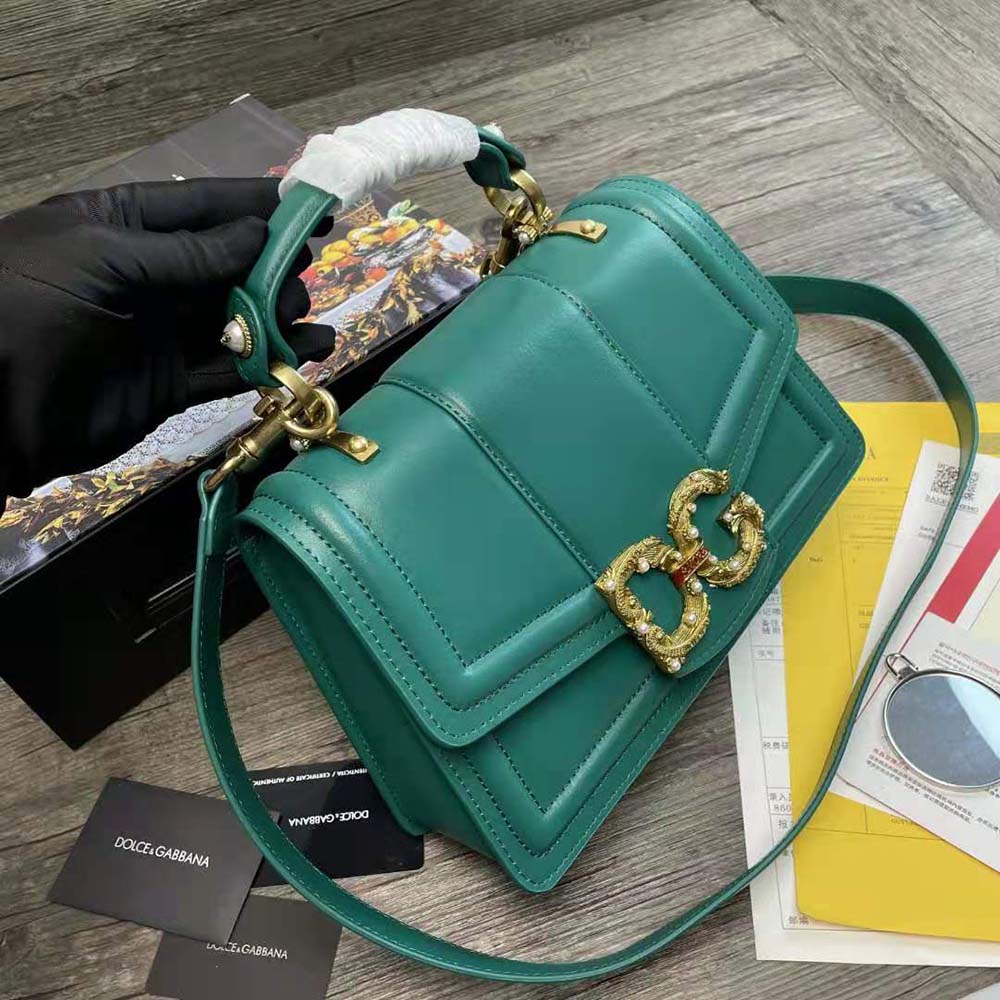 Side view showing structured silhouette of Dolce Gabbana D&G Amore Bag