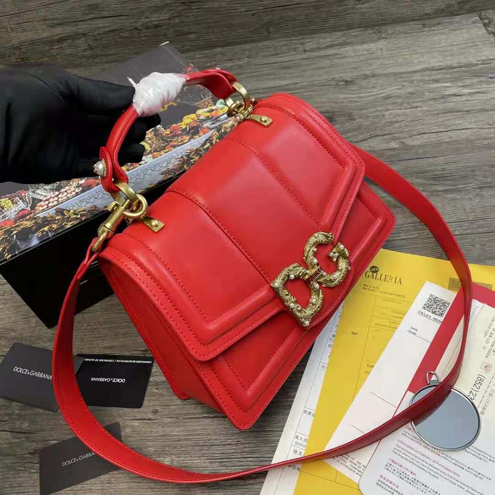 Side angle showcasing silhouette of Dolce Gabbana D&G Women Amore Bag