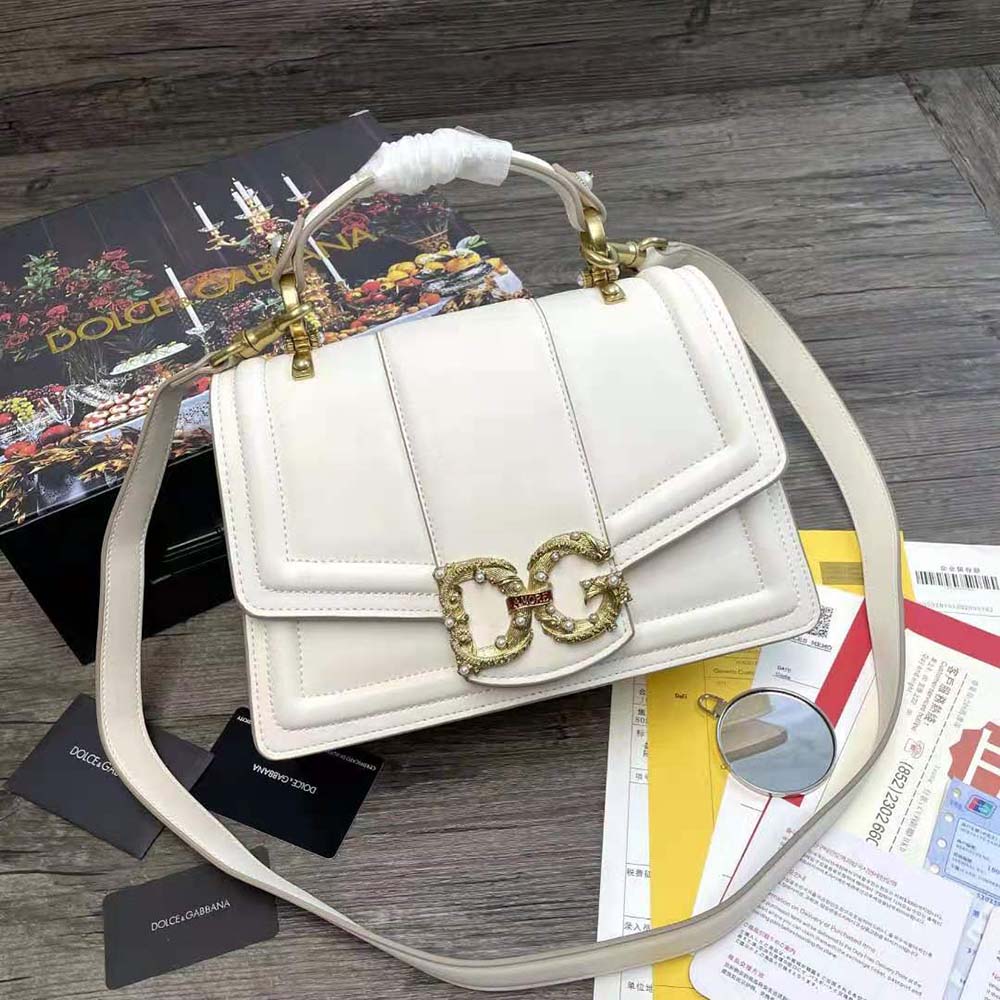 Close-up of gold-tone D&G hardware on Amore Bag flap closure