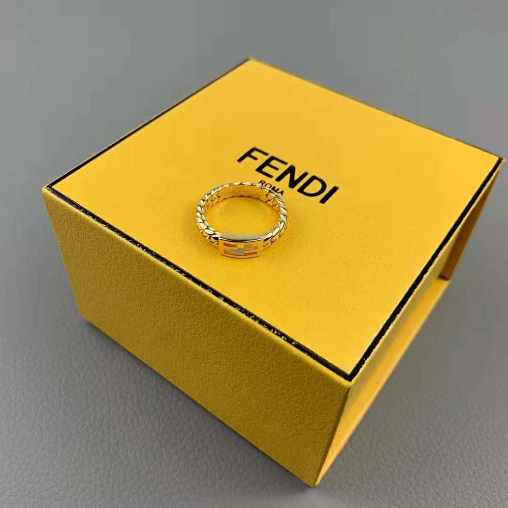 Side profile of Fendi Women Baguette Ring-Colored Ring-Gold highlighting sculptural silhouette