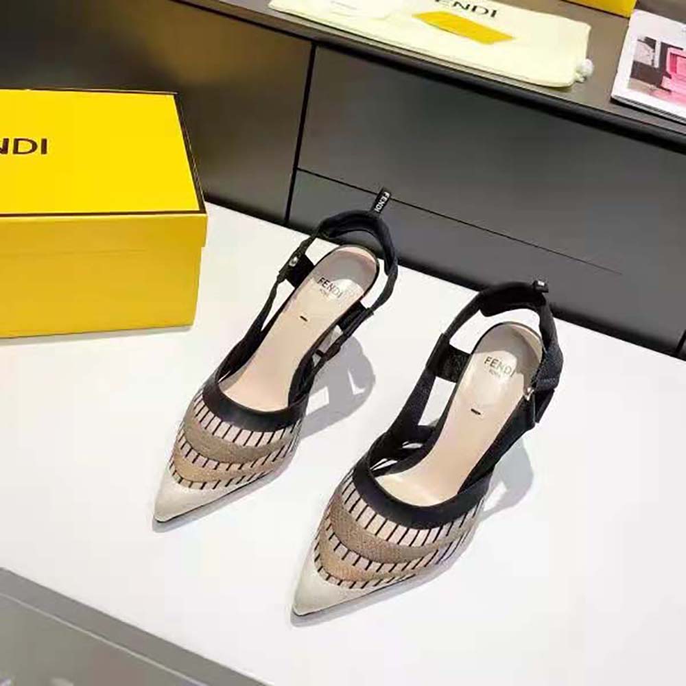 Close-up of gold-tone Fendi logo buckle on Colibri Black Micromesh slingbacks