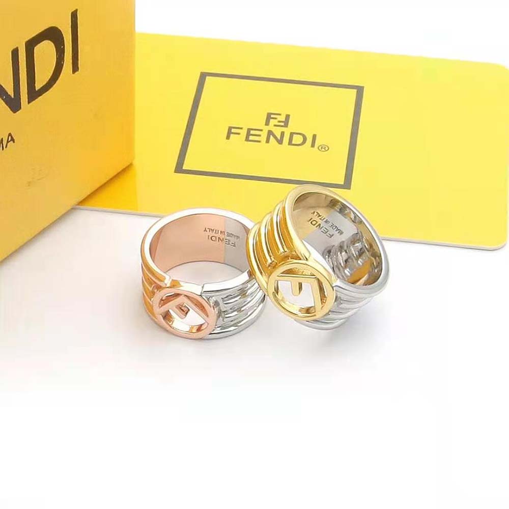 Close-up detail of Fendi ‘F’ emblem on gold and palladium ring