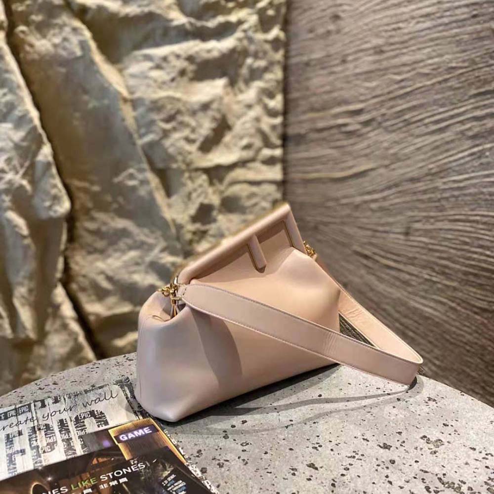 Close-up of soft pink nappa leather on Fendi Women First Medium Bag