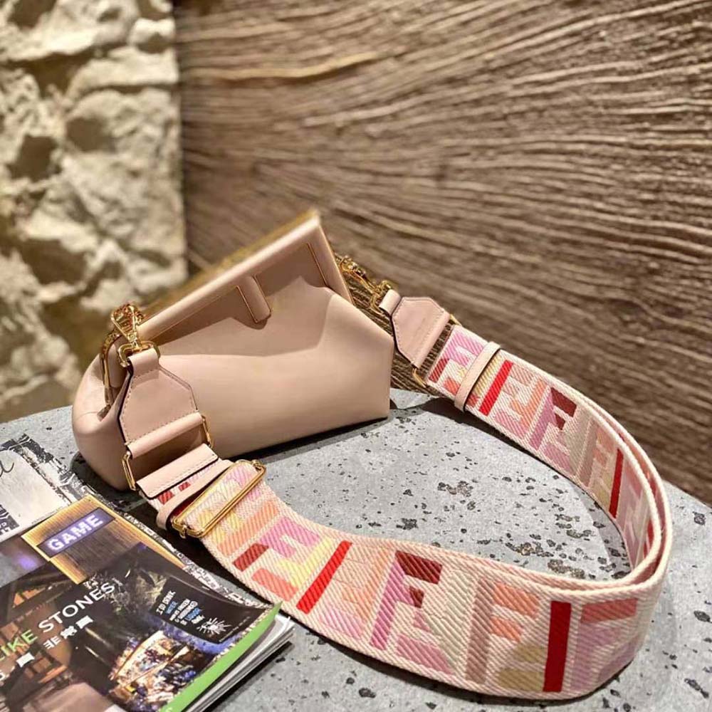 Close-up of gold hardware on Fendi Women First Small Nappa Leather Bag-Pink