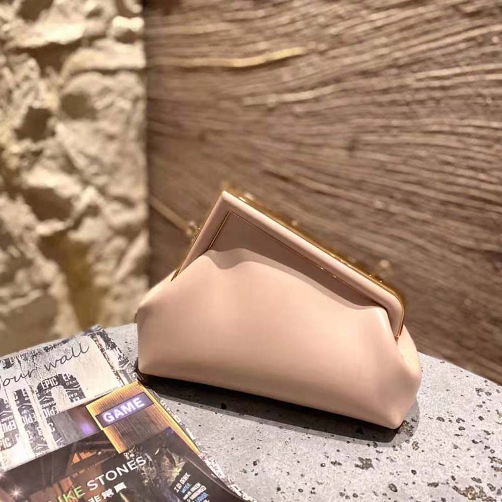 Side angle showing silhouette of Fendi Women First Small Nappa Leather Bag-Pink