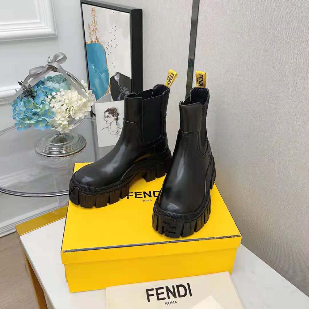 Close-up of elastic panel and branded detail on Fendi Women Force boots