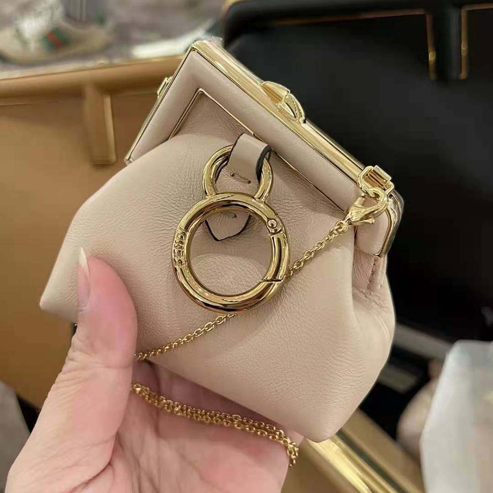 Side angle showing compact silhouette of Fendi Women Nano Fendi First Charm