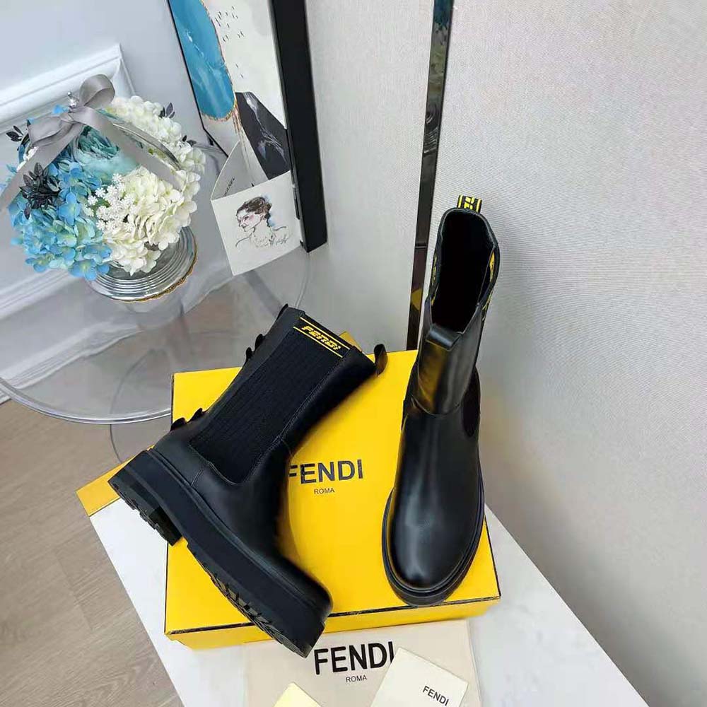 Front angle showing lace-up detail on Fendi Women Promenades boots