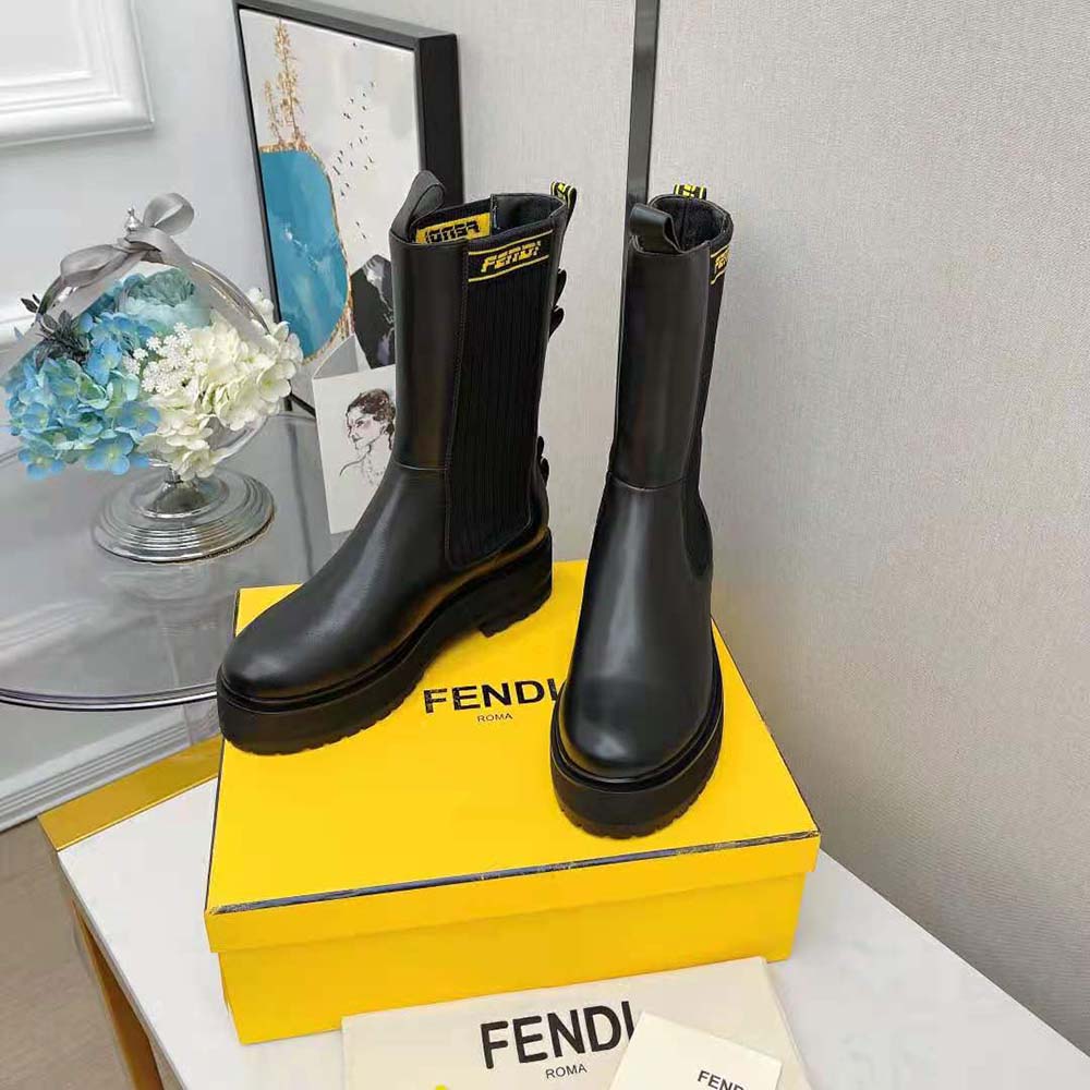 Close-up of leather and branded hardware on Fendi Women Promenades boots