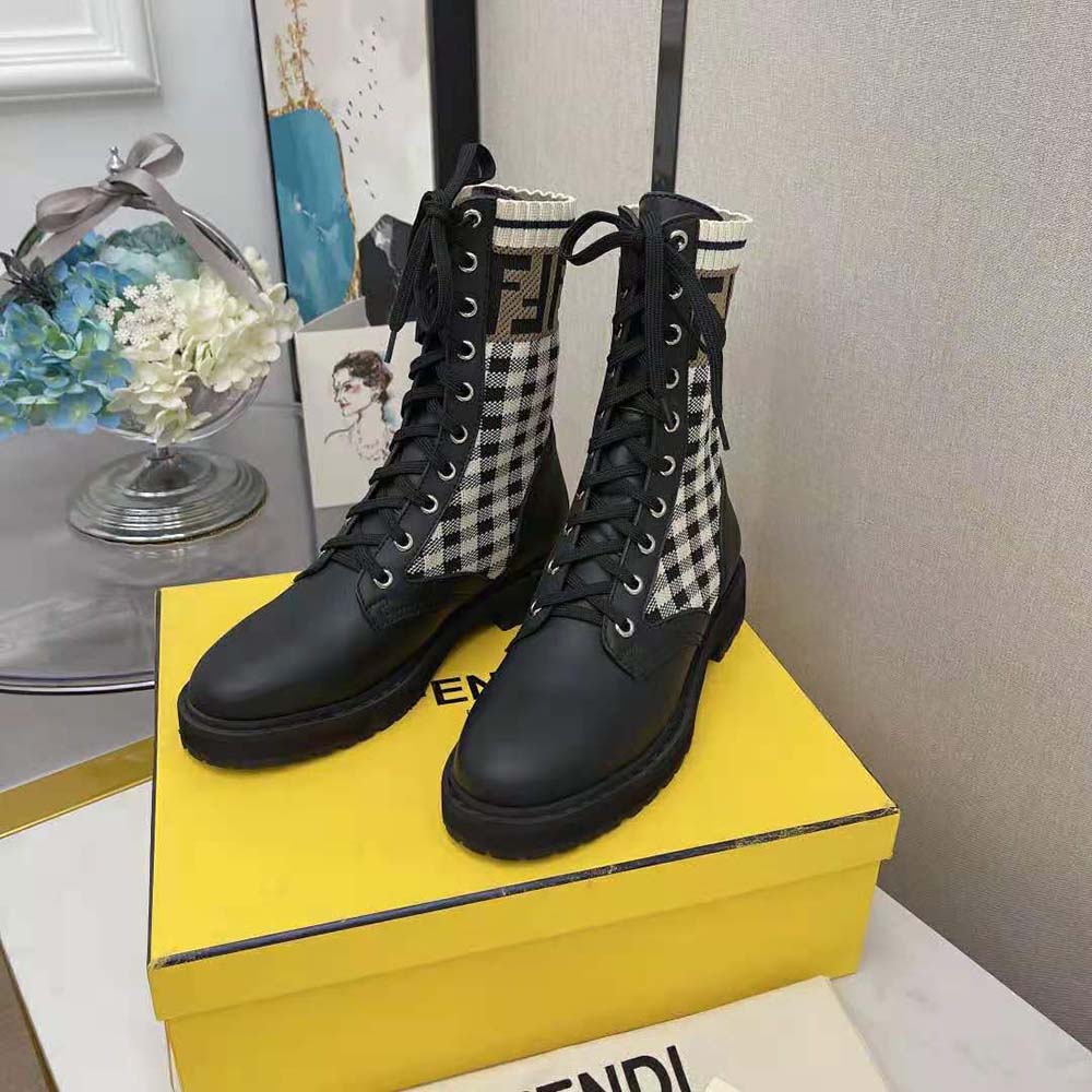 Angled shot showing rubber sole and silhouette of Fendi Women Rockoko boots