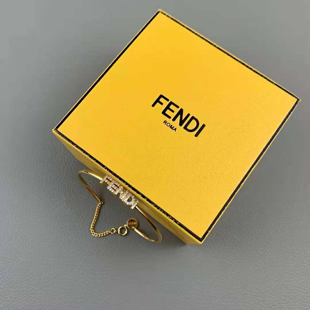 Fendi Women Signature Bracelet Gold-Colored Bracelet elegantly displayed on wrist