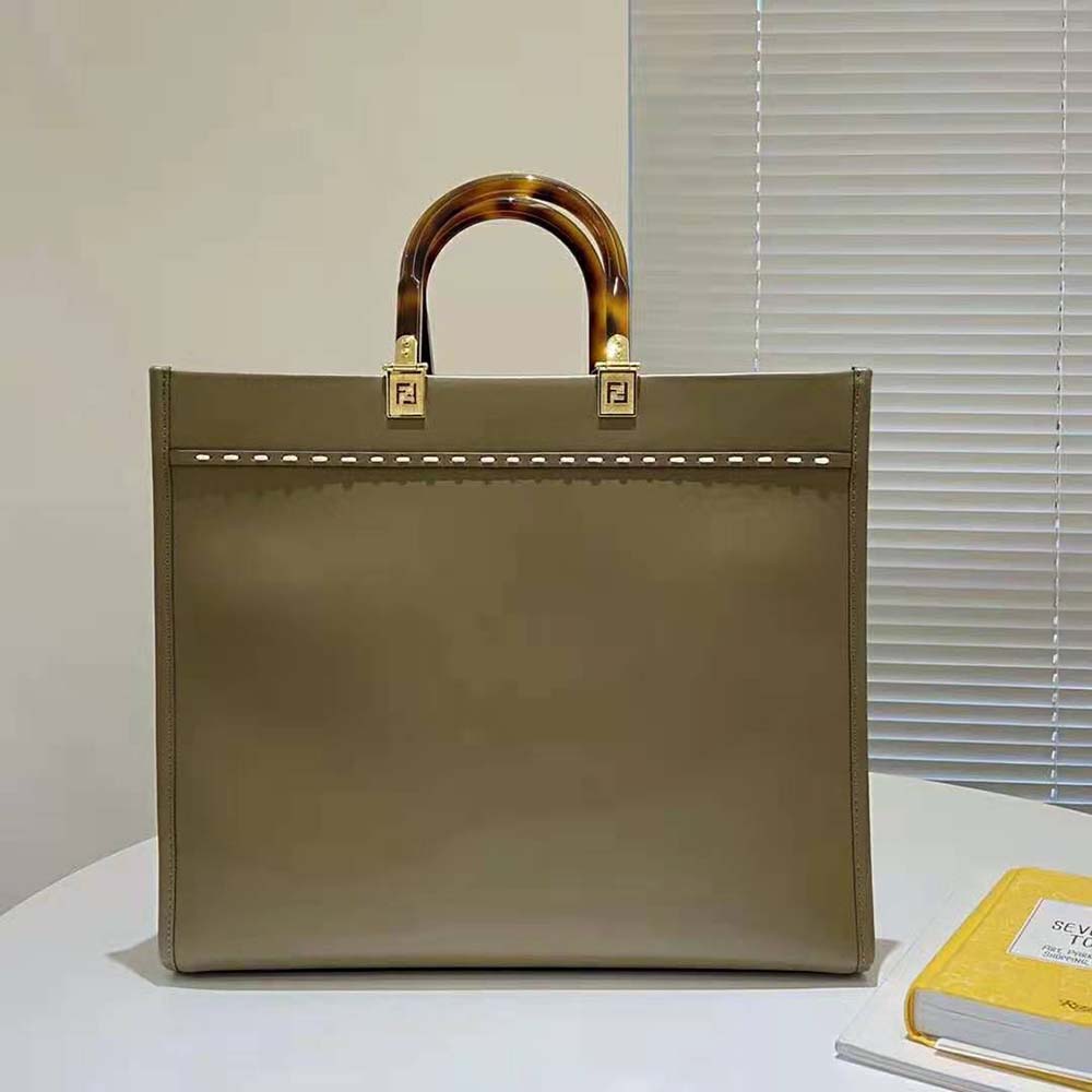 Interior view showing lining and pockets of Fendi Women Sunshine Medium Shopper
