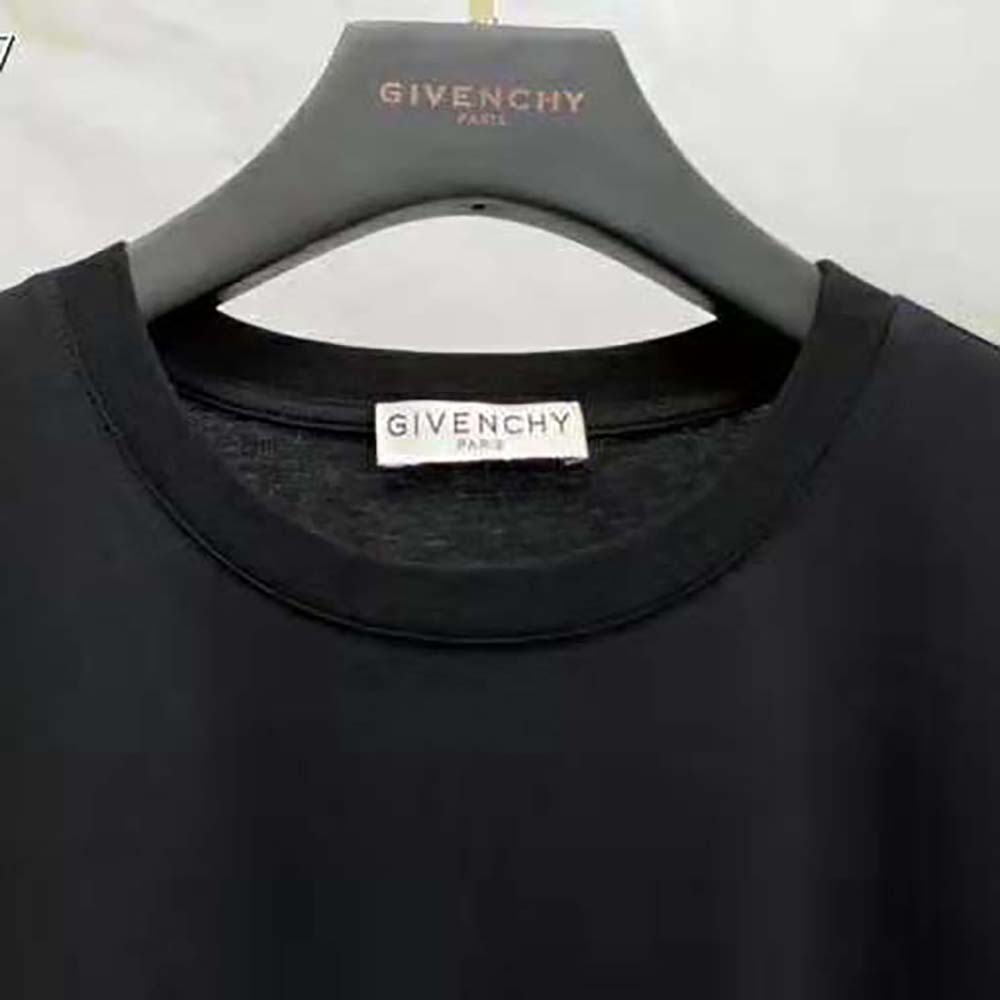 Back neck detail showing Givenchy logo on black jersey T-shirt