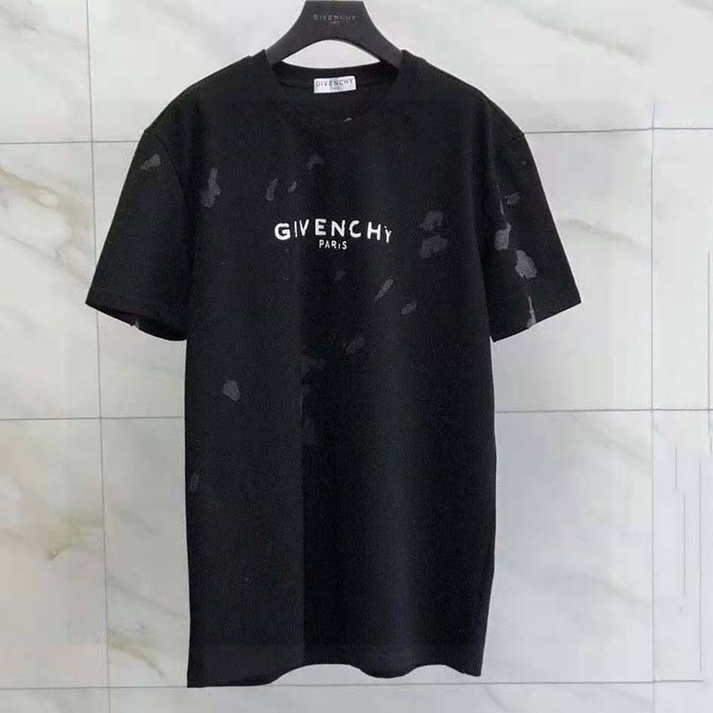Close-up of black cotton fabric and destroyed accents on Givenchy Men Paris T-Shirt