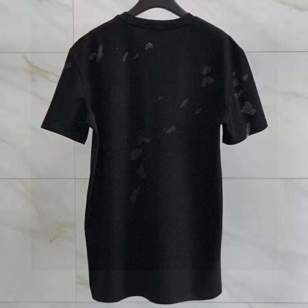 Side angle of Givenchy Men Paris Destroyed T-Shirt-Black highlighting silhouette