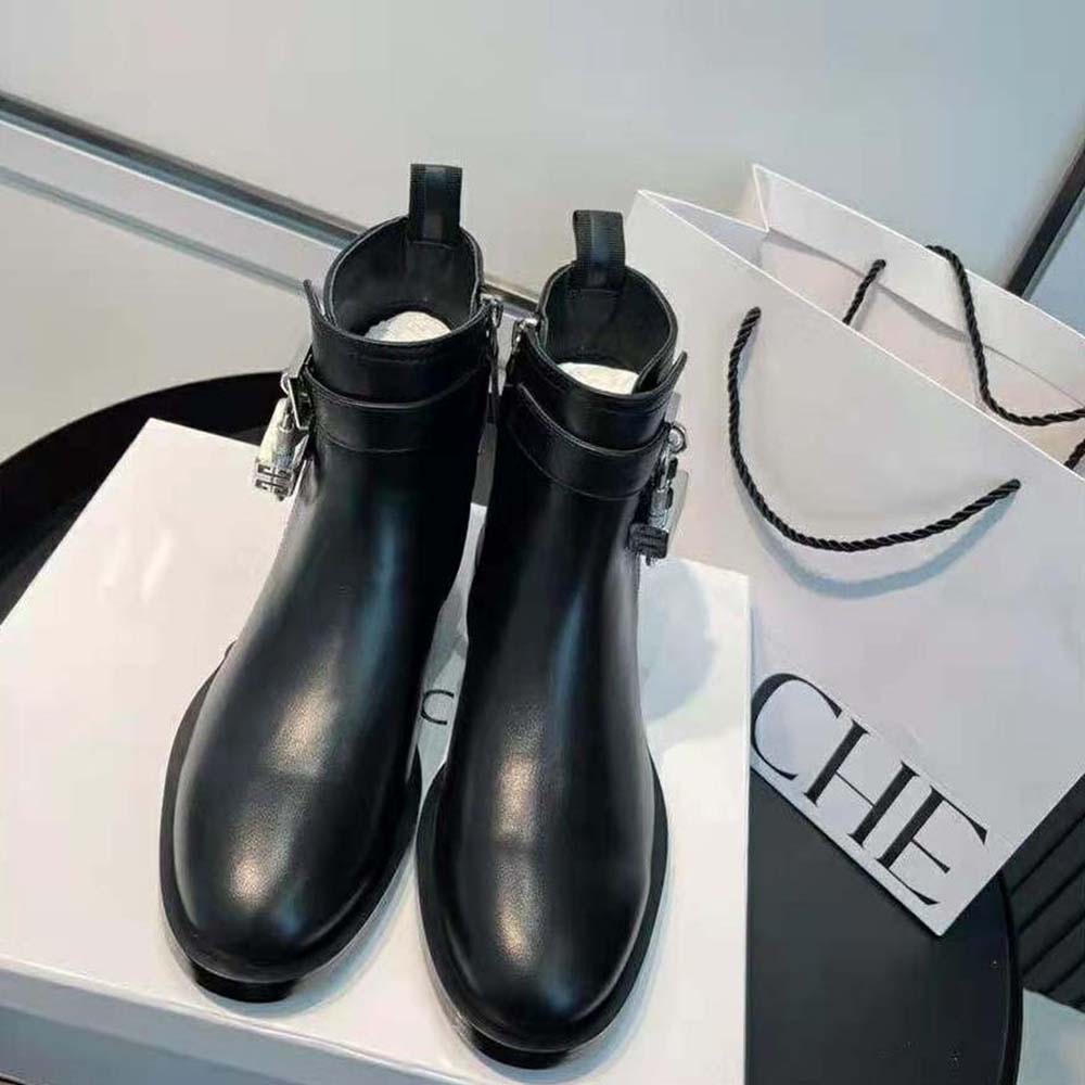 Close-up of padlock hardware detail on Givenchy Women Boots in Leather