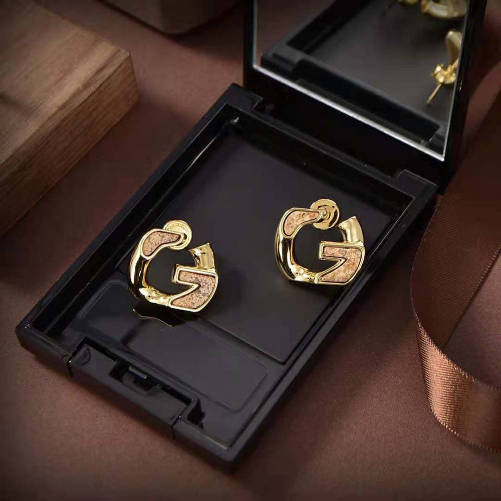 Side angle showing push-back closure of Givenchy chain earrings