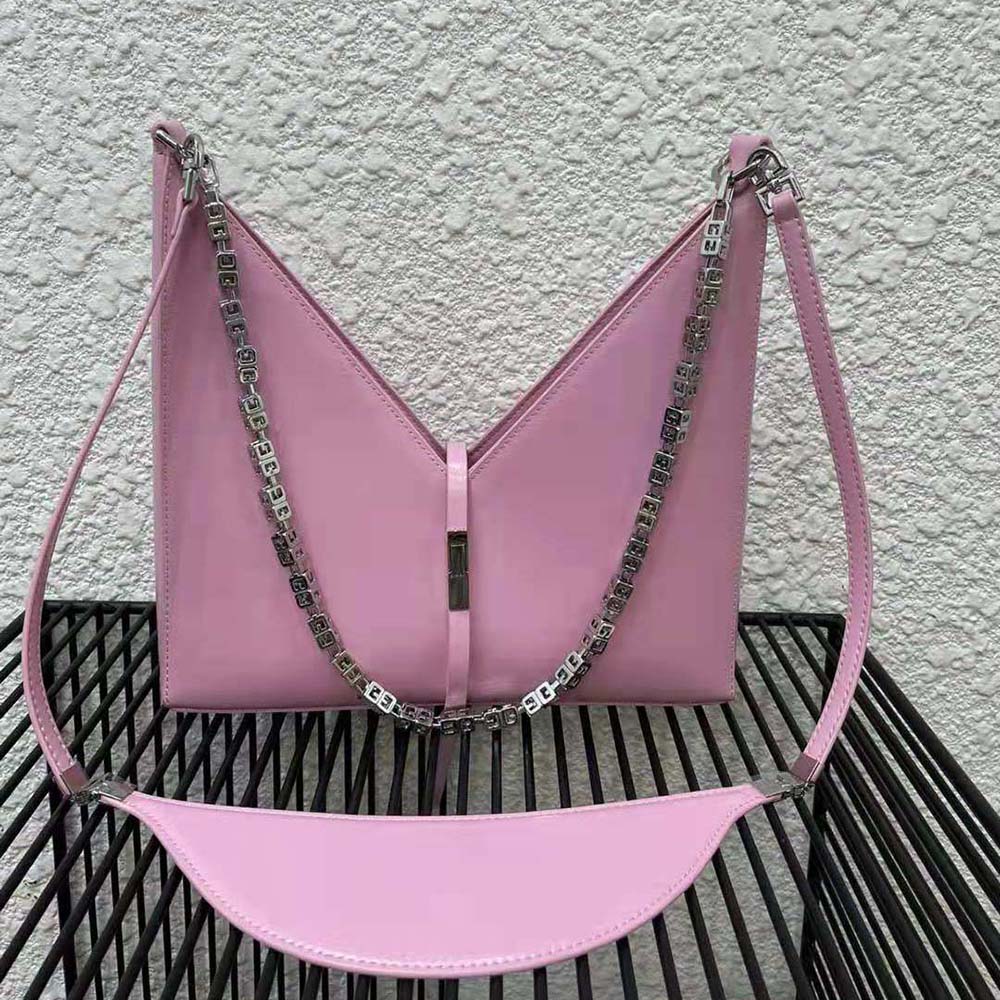 Close-up of signature cut-out and silver chain on Givenchy pink bag