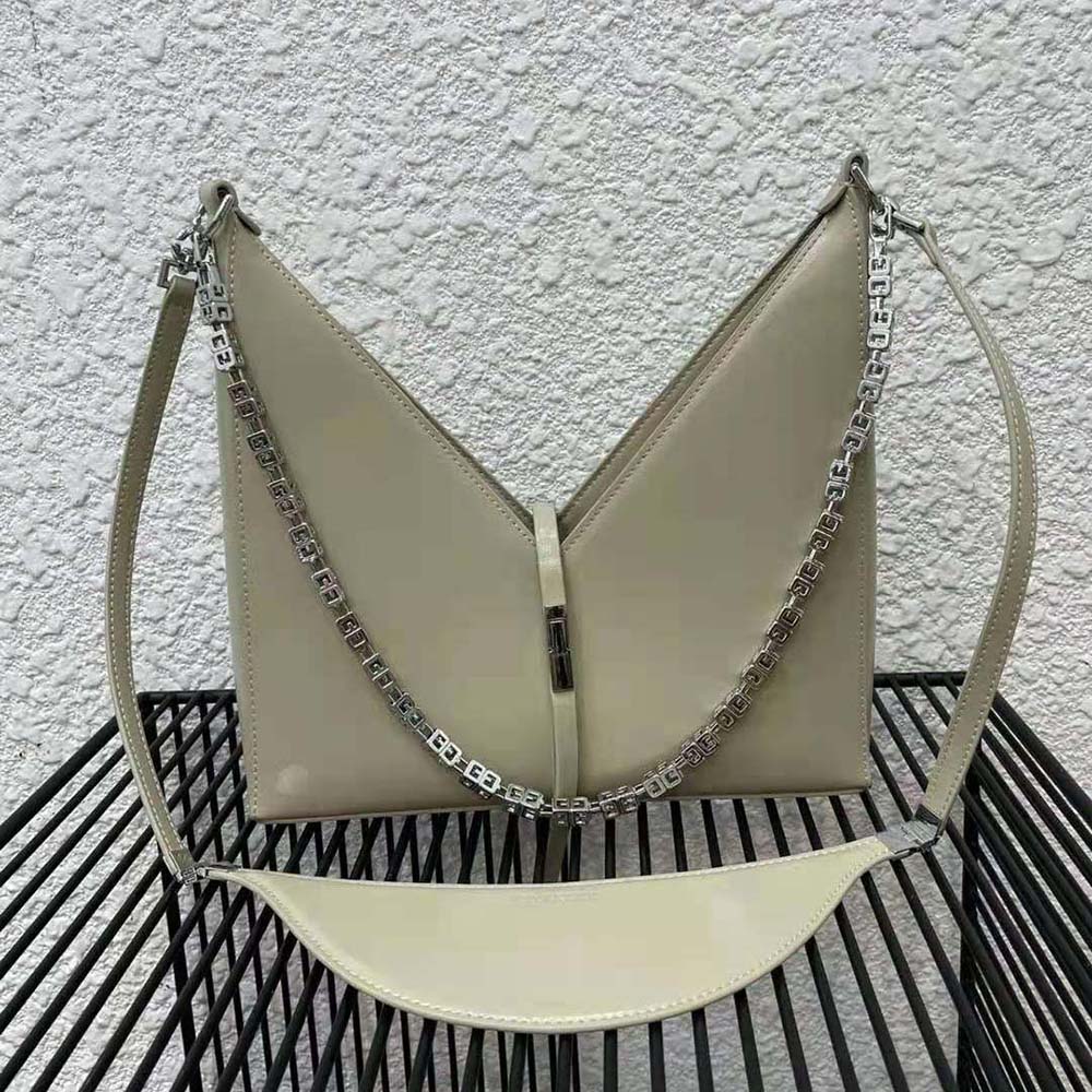 Close-up of gold chain strap and cut-out detail on Givenchy bag