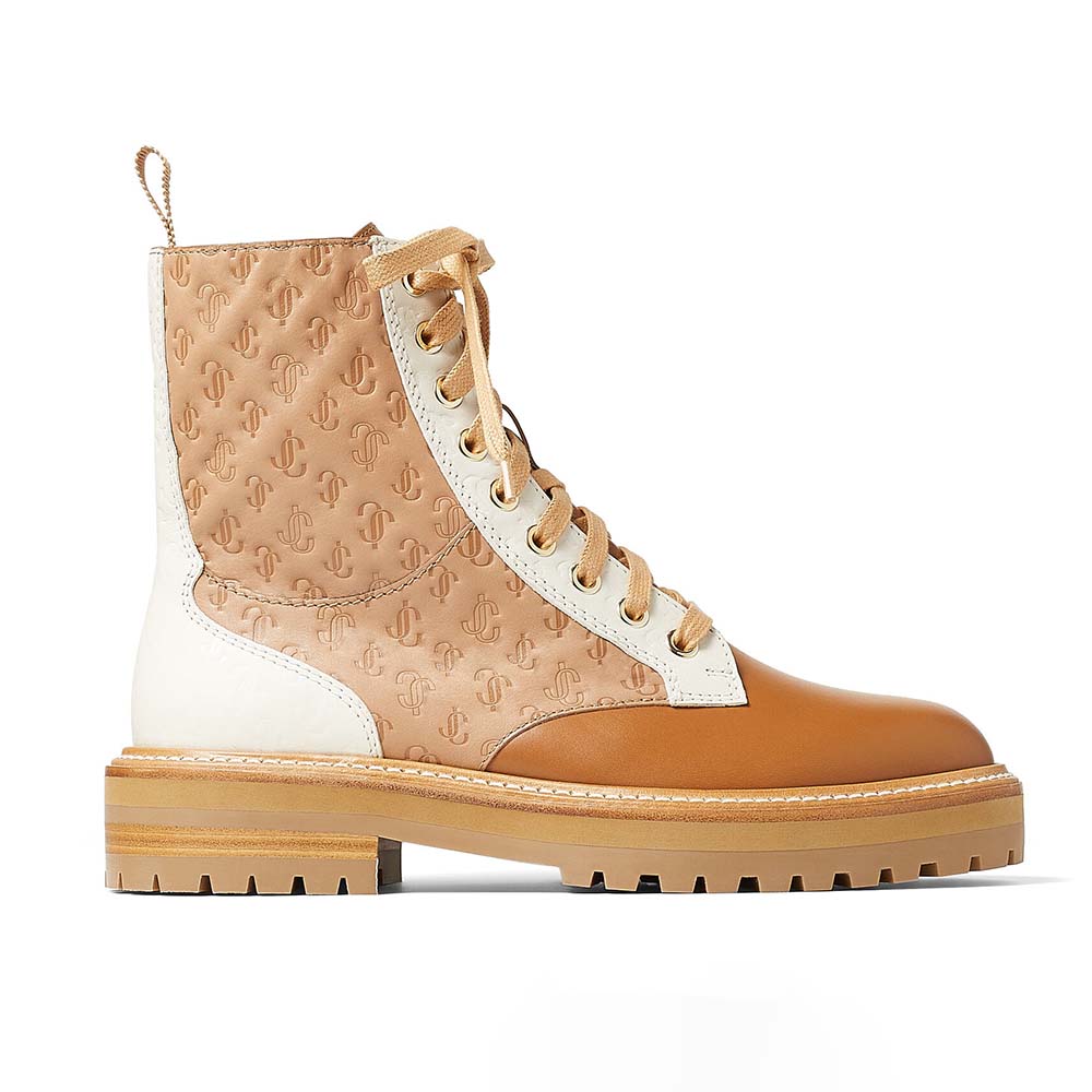 Front angle of Jimmy Choo Women Cora Flat Caramel JC Monogram Leather Mix Combat Boots