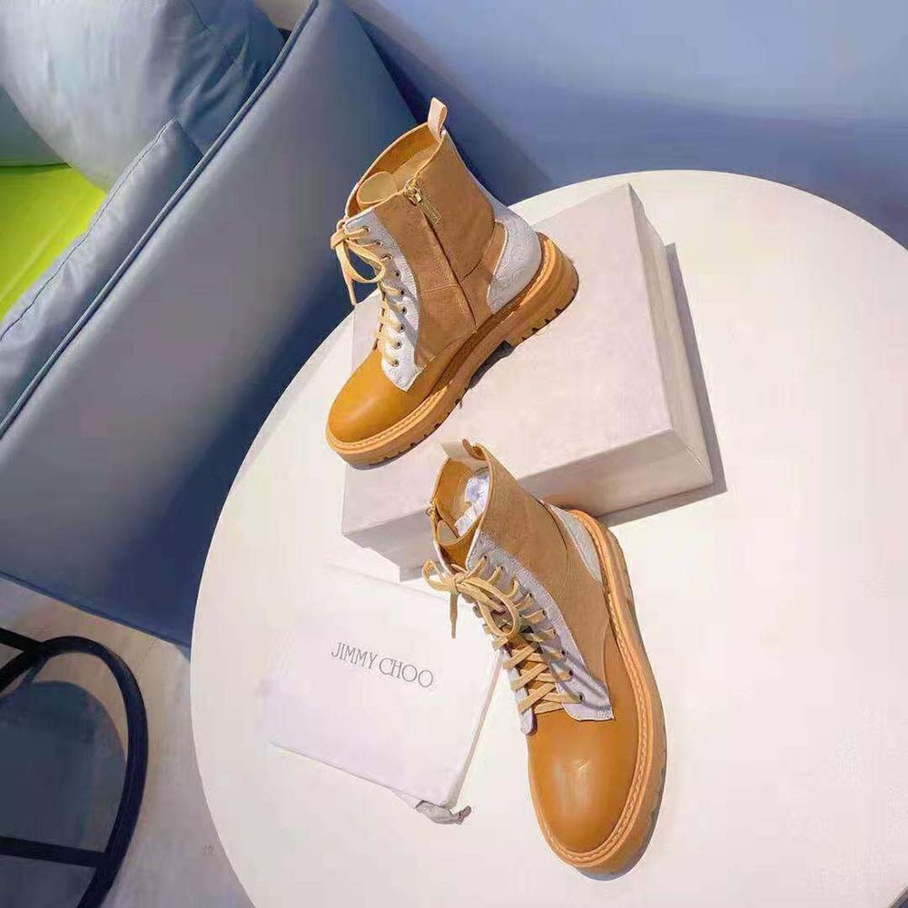 Side view showing leather mix texture on Jimmy Choo Cora Flat Combat Boots