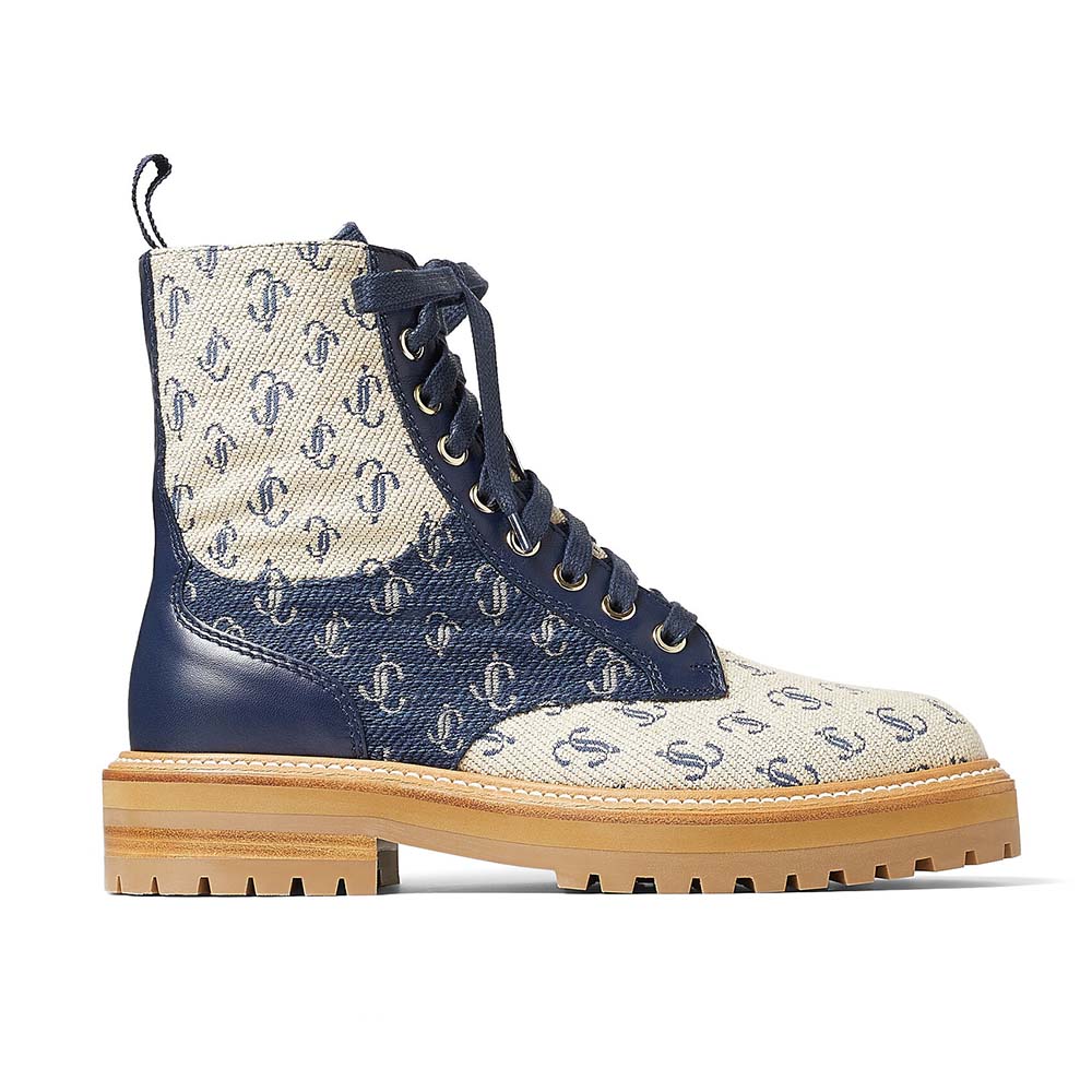 Side view of Jimmy Choo Women Cora Flat Sand Dune combat boots in navy