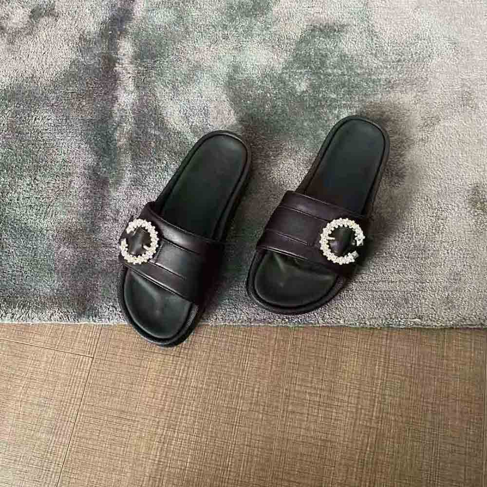 Top-down shot of Jimmy Choo Women Fallon Black Nappa Leather Slides slip-on style
