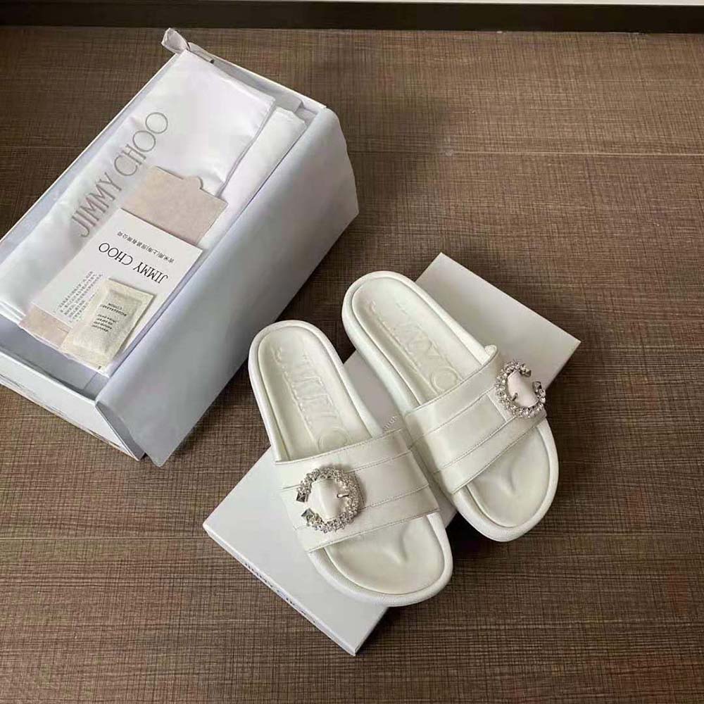 Side profile of Jimmy Choo Fallon White Nappa Leather Slides showing silhouette
