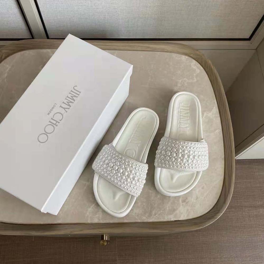 Close-up of pearly embellishments on Jimmy Choo Women Fitz/F White Canvas and Leather Pool Slides