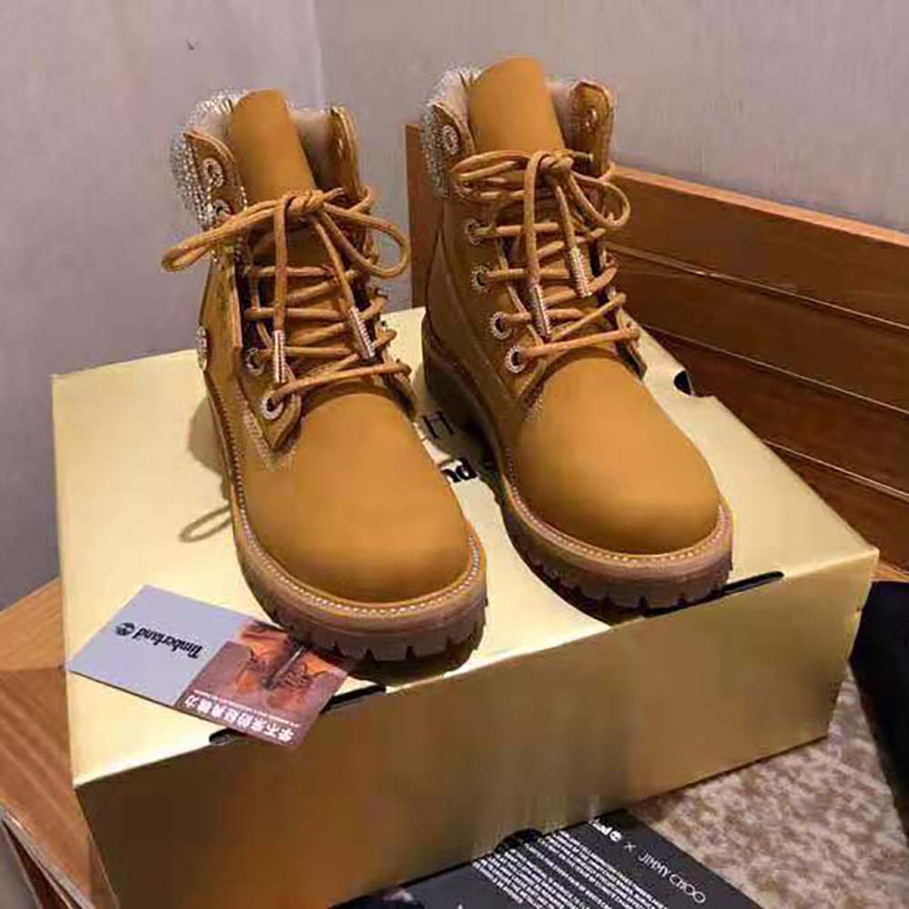 Front angle showing brown nubuck texture on Jimmy Choo Women JC X Timberland/F Wheat Nubuck Leather Boots