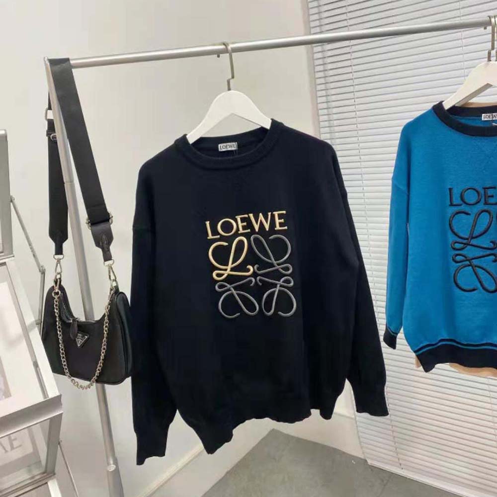 Close-up of embroidered Anagram logo on black Loewe sweatshirt