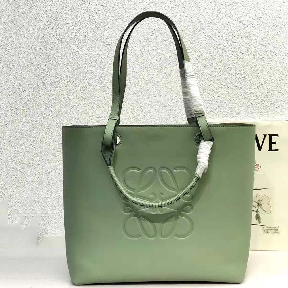 Close-up of gold-tone Anagram hardware on Loewe Women Anagram Tote