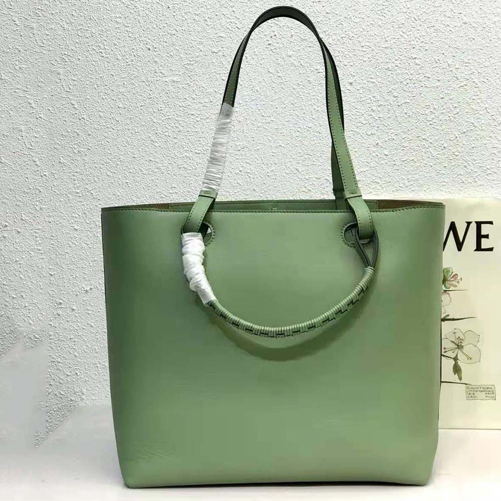 Side profile showing magnetic closure on Loewe Women Anagram Tote