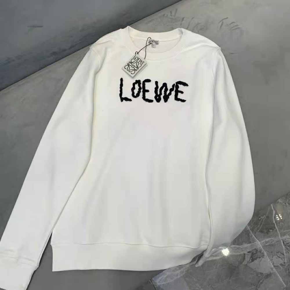 Close-up detail of signature embroidery on Loewe sweatshirt