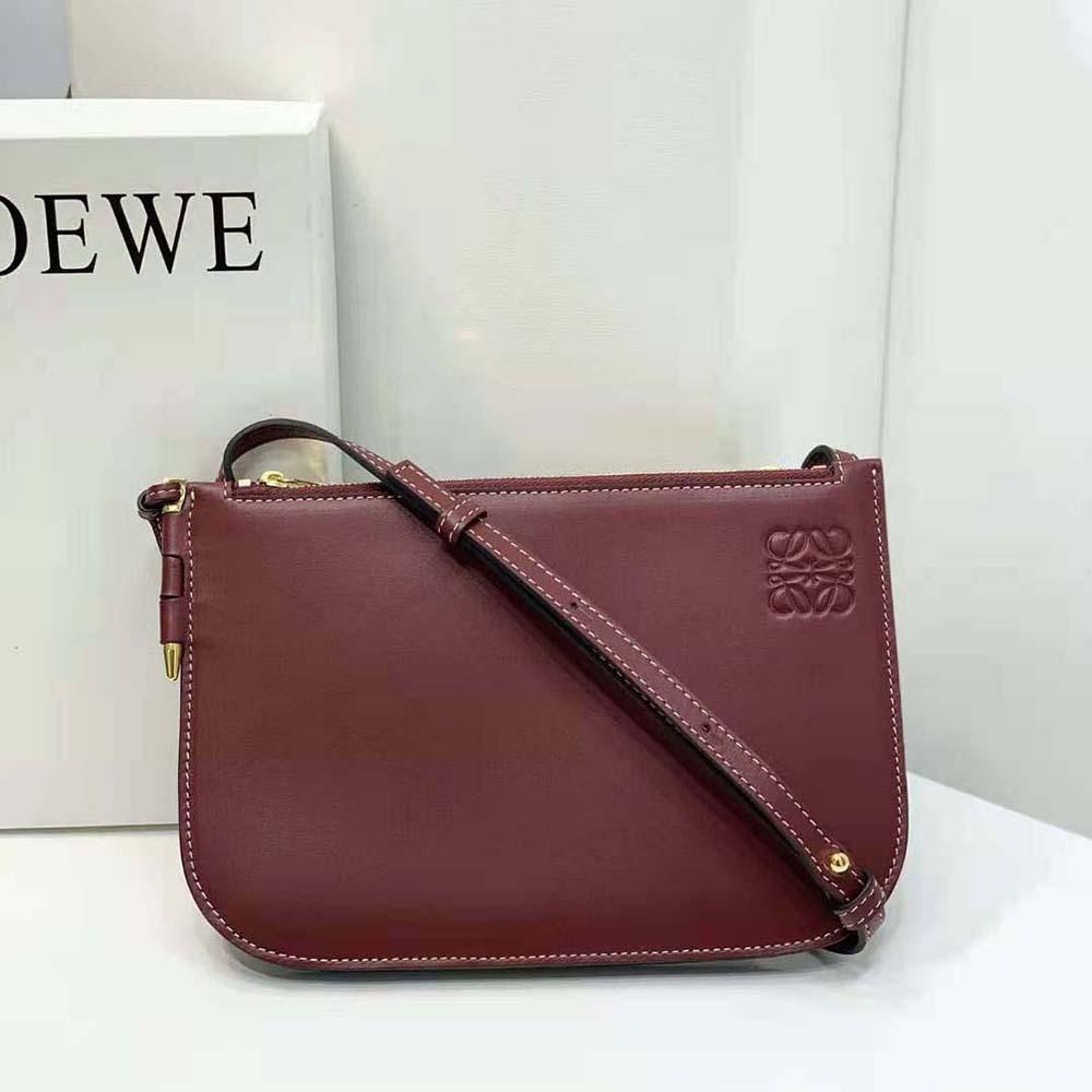 Close-up of signature Gate hardware and double zip on Loewe pouch