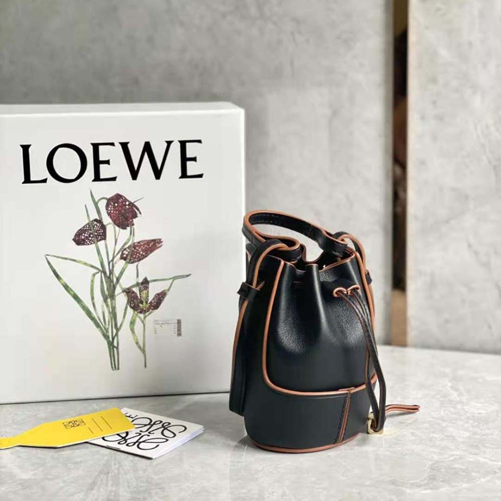 Close-up on silver hardware and embossed logo of Loewe Women Nano Balloon Bag