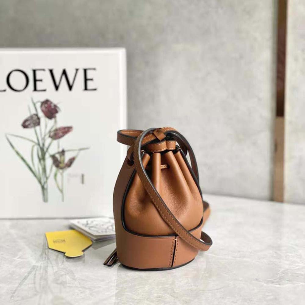 Side profile showing silhouette and strap detail of Loewe Women Nano Balloon Bag