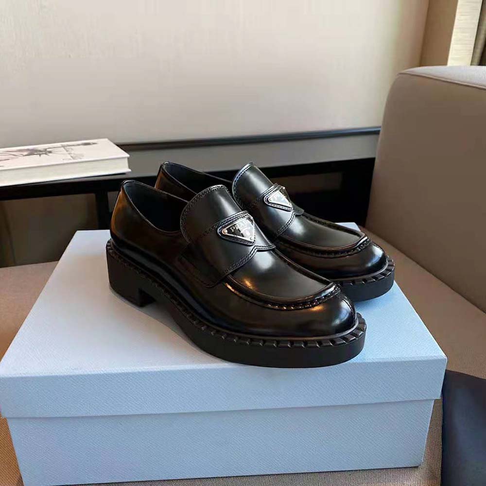 Overhead view of Prada Women Brushed Leather Loafers-Black highlighting slip-on design